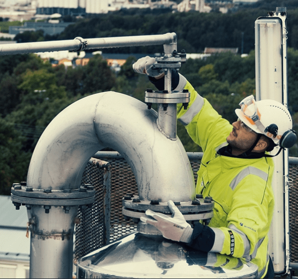 construction worker using wrench